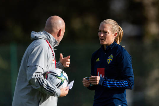Magnus Wikman, assistant coach, and Magdalena Eriksson of