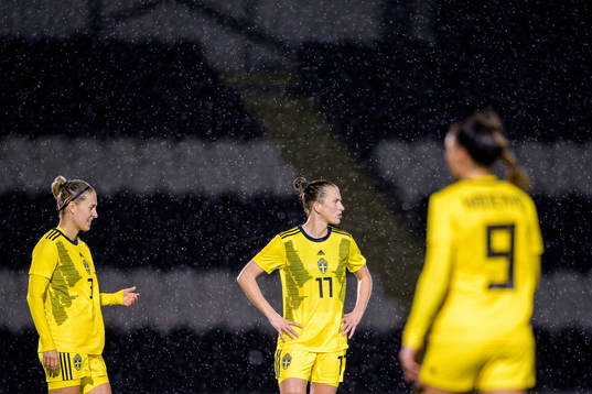 Emma Kullberg and Emma Berglund of Sweden look dejected