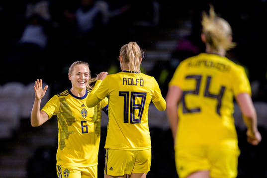 Magdalena Eriksson and Fridolina Rolfö of Sweden celebrate