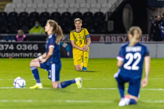 Nilla Fischer of Sweden kneels