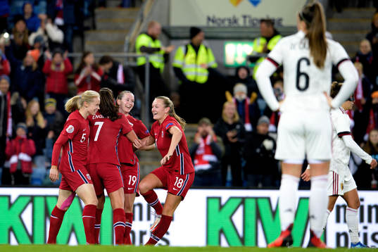 Elisabeth Terland and Frida Maanum of Norway celebrate the
