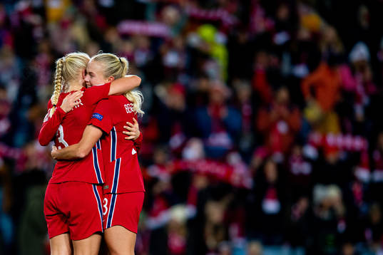 Maria Thorisdottir and Guro Bergsvand of Norway celebrate