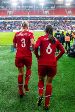 Maria Thorisdottir and Tuva Hansen of Norway at half-time