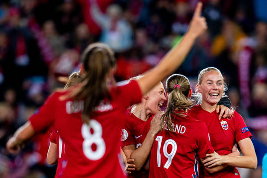 Guro Bergsvand of Norway celebrates with teammates Maria
