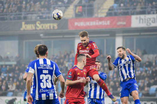 Djurgårdens Jacob Une Larsson och Haris Radetinac mot IFK