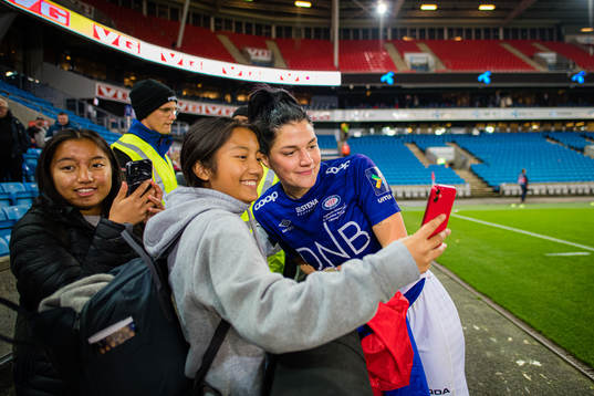 Dejana Stefanovic of Vålerenga taking a selfie with a fan