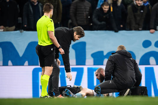 Jo Inge Berget of Malmö FF recieves medical attention