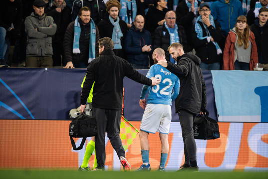 Jo Inge Berget of Malmö FF recieves medical attention