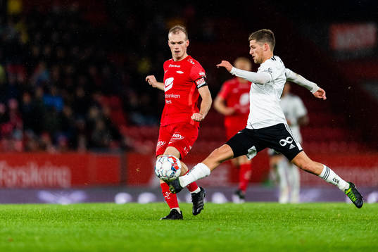 Petter Strand of Brann and Carlo Holse of Rosenborg