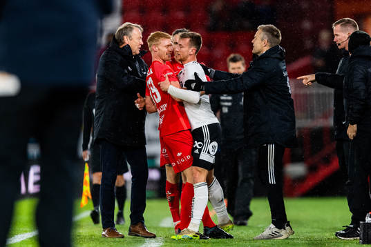 Åge Hareide, head coach of Rosenborg, tries to separate