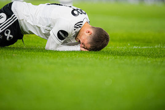 Carl Johan Holse Justesen of Rosenborg in pain