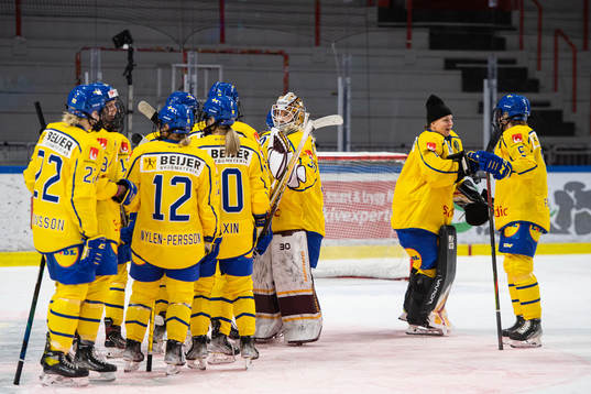 Players of Sweden celebrate