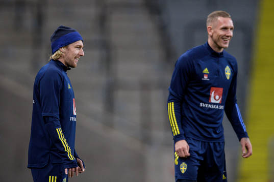 Emil Forsberg and goalkeeper Robin Olsen of the Swedish