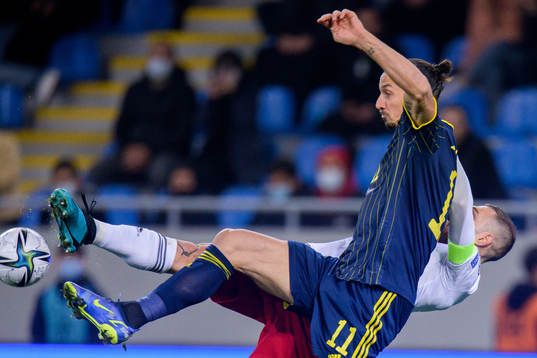 Zlatan Ibrahimovic of Sweden and Guram Kashia of Georgia
