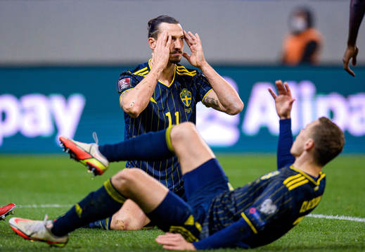 Zlatan Ibrahimovic and Viktor Claesson of Sweden reacts