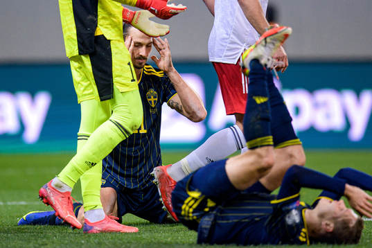 Zlatan Ibrahimovic and Viktor Claesson of Sweden reacts