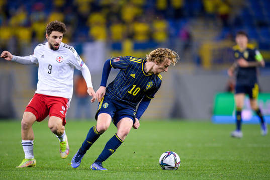 Nika Kacharava of Georgia and Emil Forsberg of Sweden