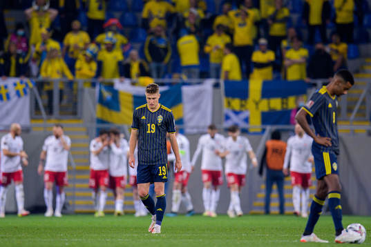Mattias Svanberg and Alexander Isak of Sweden look dejected