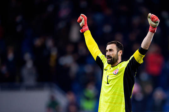 Goalkeeper Giorgi Loria of Georgia celebrates