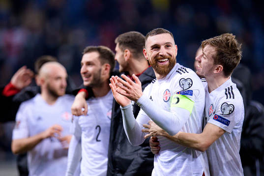 Guram Kashia and Saba Lobzhanidze of Georgia celebrate