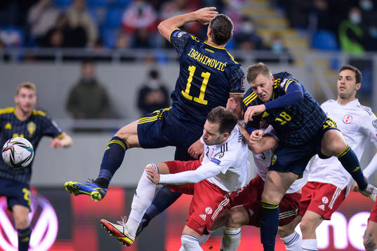 Zlatan Ibrahimovic and Joakim Nilsson of Sweden in action