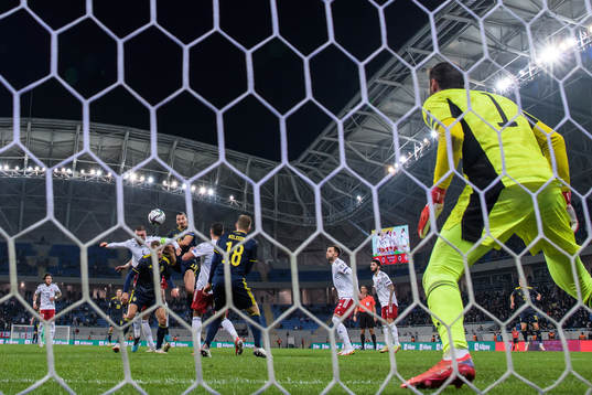 Guram Kashia of Georgia in action against Zlatan