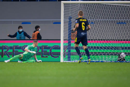 Goalkeeper Robin Olsen of Sweden lets in the 2-0 goal from
