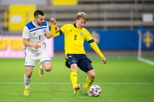 Milan Savic of Bosnia-Herzegovina and Daniel Svensson of