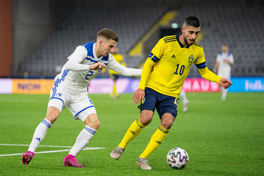 Jasmin Osmic of Bosnia-Herzegovina and Rami Al Hajj of