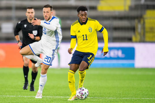 Andrej Dokanovic of Bosnia-Herzegovina and Anthony Elanga