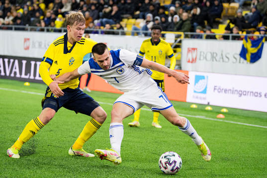 Daniel Svensson of Sweden and Milan Savic of