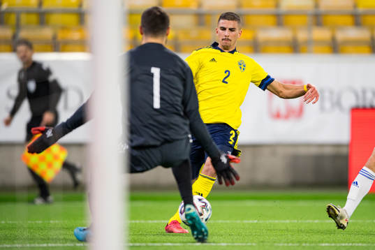 Hussein Ali of Sweden against goalkeeper Nikola Ćetković