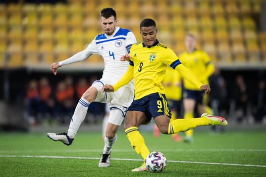 Dorde Milojevic of Bosnia-Herzegovina and Amin Sarr of