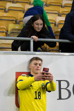 Erik Ring of Sweden celebrates with spectators