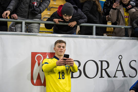 Erik Ring of Sweden celebrates with spectators