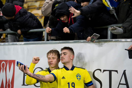 Daniel Svensson and Tim Prica of Sweden celebrates with