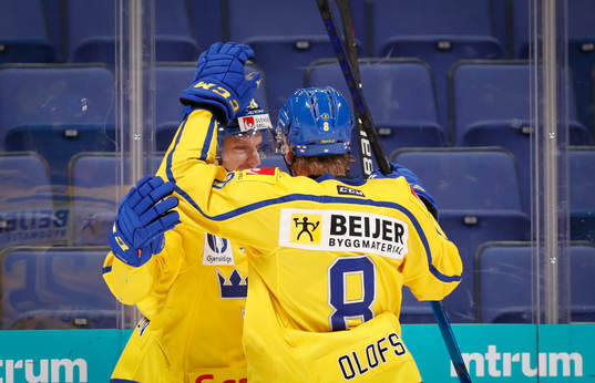 Anton Bengtsson and Fredrik Olofsson of Sweden celebrating