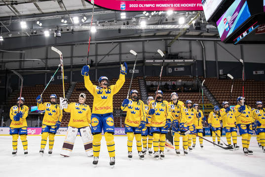 Players of Sweden celebrate