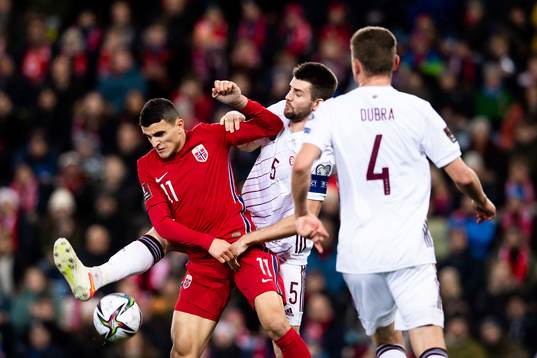 Mohamed Elyounoussi of Norway and Antonijs Cernomordijs of