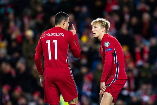 Mohamed Elyounoussi and Birger Meling of Norway