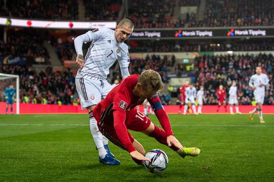 Vladimirs Kamess of Latvia and Martin Ødegaard of Norway