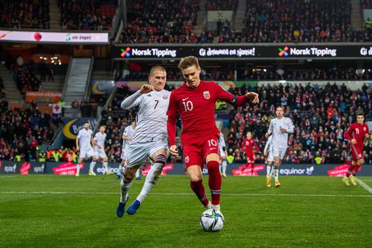Vladimirs Kamess of Latvia and Martin Ødegaard of Norway