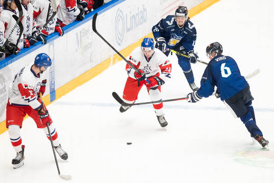 Lukas Pajer of Czech Republic and Ville Koivunen and Eemil