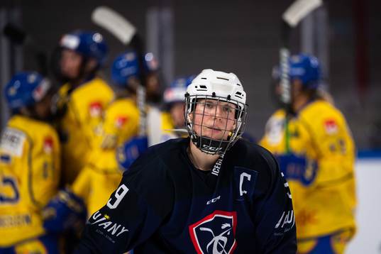 Marion Allemoz of France looks dejected