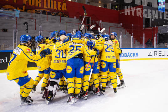 Players of Sweden celebrate