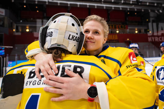 goalkeeper Sara Grahn and Johanna Fällman of Sweden