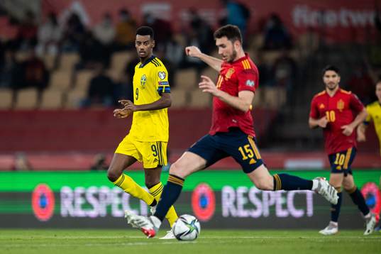 Alexander Isak of Sweden and Aymeric Laporte of Spain