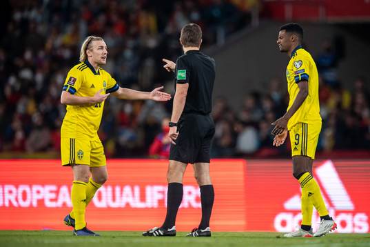 Emil Forsberg and Alexander Isak of Sweden in a discussion