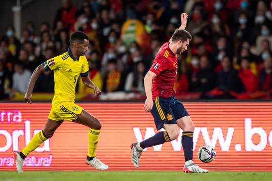 Alexander Isak of Sweden and Aymeric Laporte of Spain