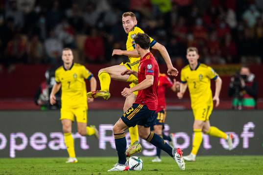 Dejan Kulusevski of Sweden and Pau Torres of Spain